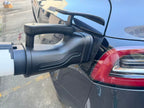 GB/T to CCS2 DC adapter connected to a vehicle; confirm the exact vehicle and charger compatibility